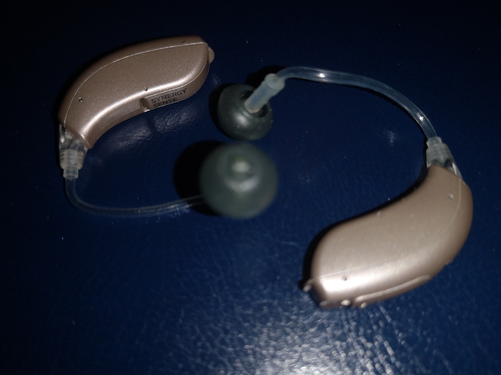 invisible hearing aids nhs